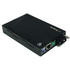 StarTech.com 10/100 Mbps Single Mode Fiber Media Converter SC 30 km 1 x Network (RJ-45) - 1 x SC Ports - DuplexSC Port - Single-mode - 1310 nm Fiber - Fast Ethernet - 10/100Base-TX, 100Base-FX - 30 km - AC Adapter - Desktop, Rack-mountable - TAA Compliant